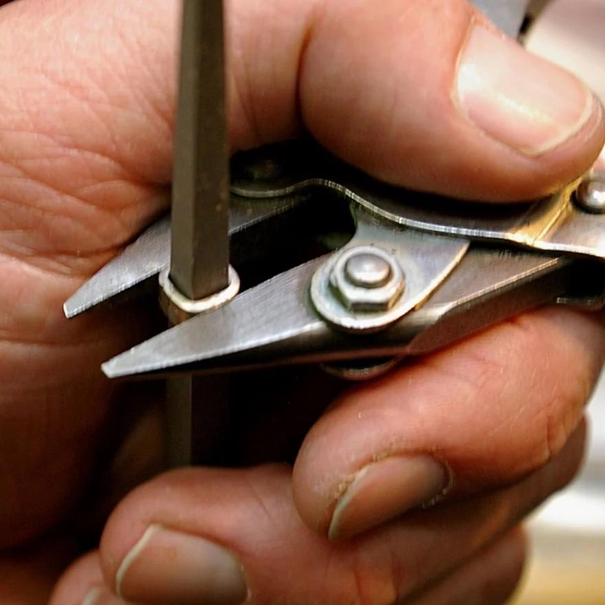 Final shaping and squaring of the bezel.