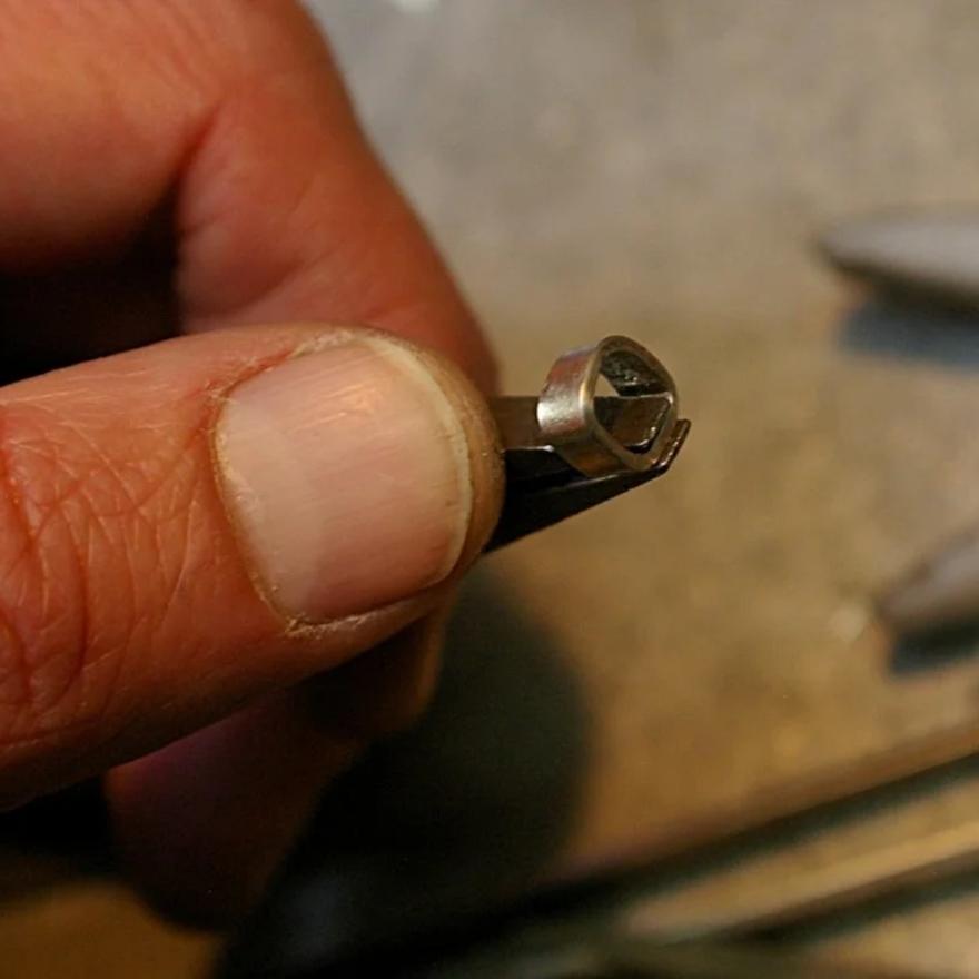 Bending the bezel to size.