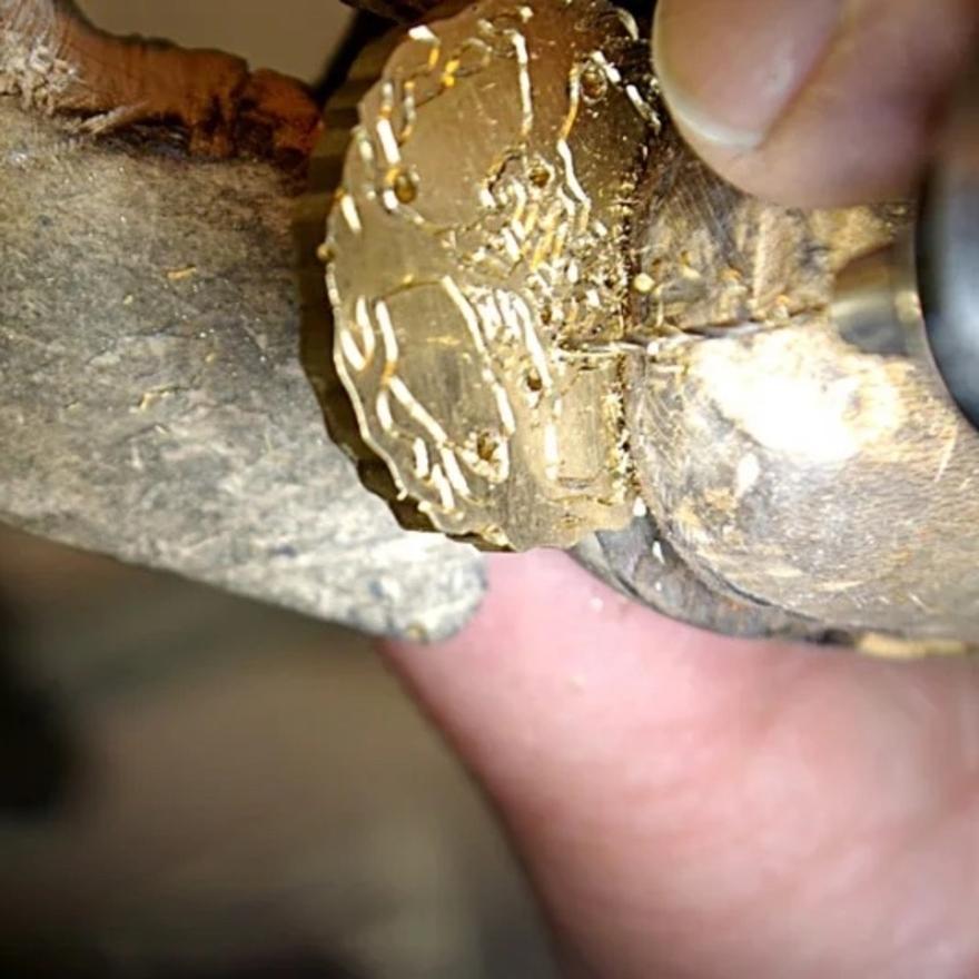 Drilling pilot holes for saw blade.