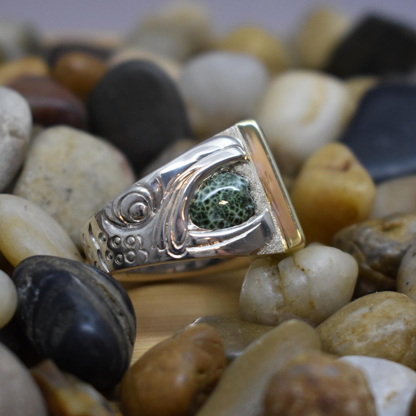 Open mouth fish and stone