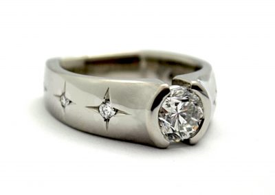 7ct diamond engagement ring with star set accent diamonds, palladium