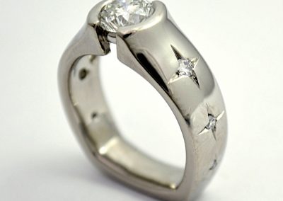 .7ct diamond engagement ring with star set accent diamonds, palladium