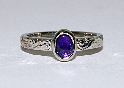 Rare purple yogo sapphire oval cabochon engagement ring, hand engraved, palladium